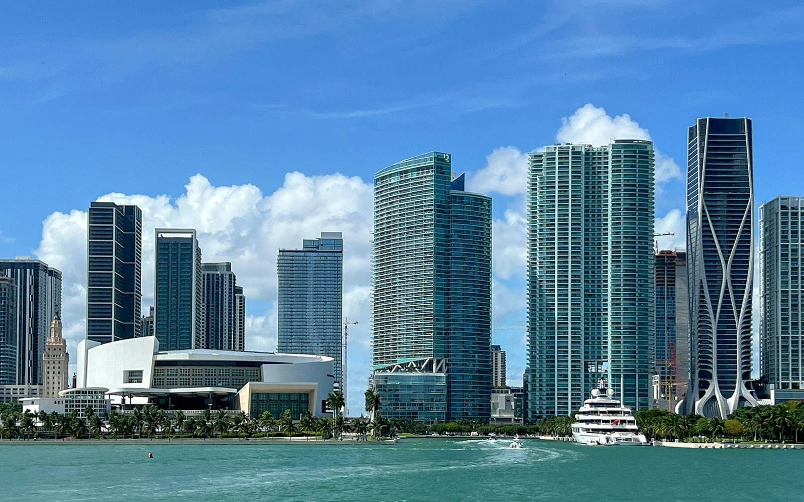 Miami skyline view from luxury yacht on Millionaire's Homes cruise, South Beach, Venetian Island.