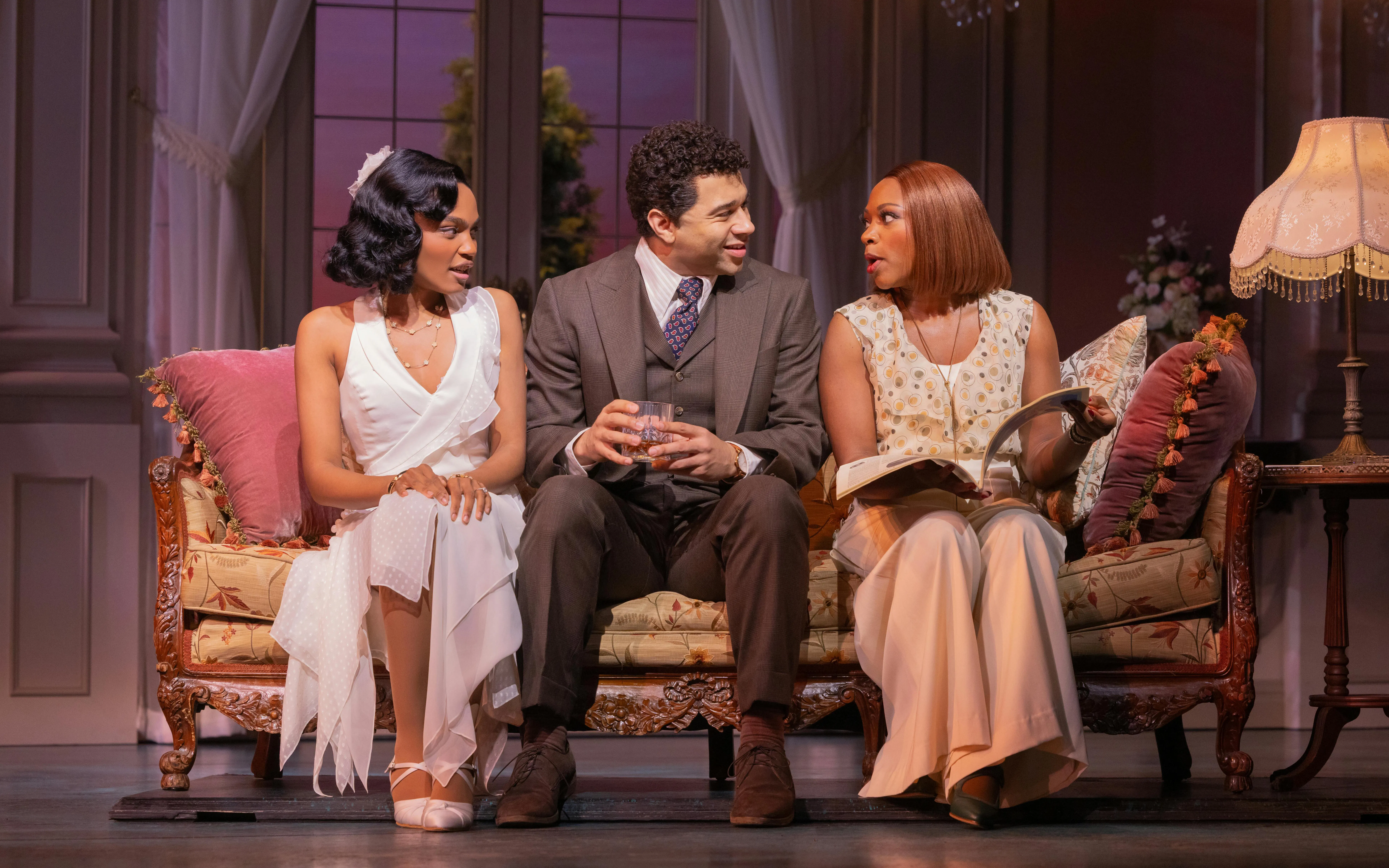 Actors in a living room scene from The Great Gatsby musical on Broadway.