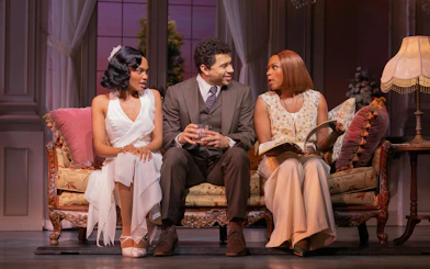 Actors in a living room scene from The Great Gatsby musical on Broadway.
