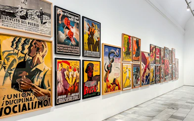 Reina Sofia Museum art display featuring historical posters.