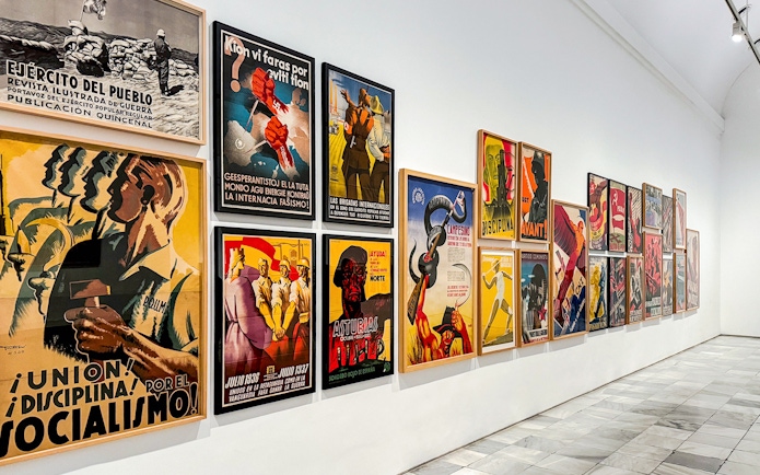 Reina Sofia Museum art display featuring historical posters.