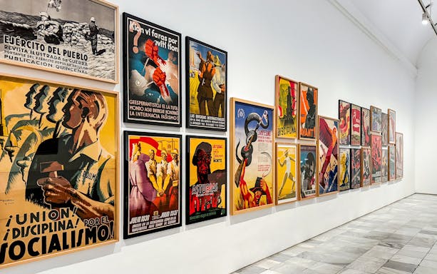 Reina Sofia Museum art display featuring historical posters.