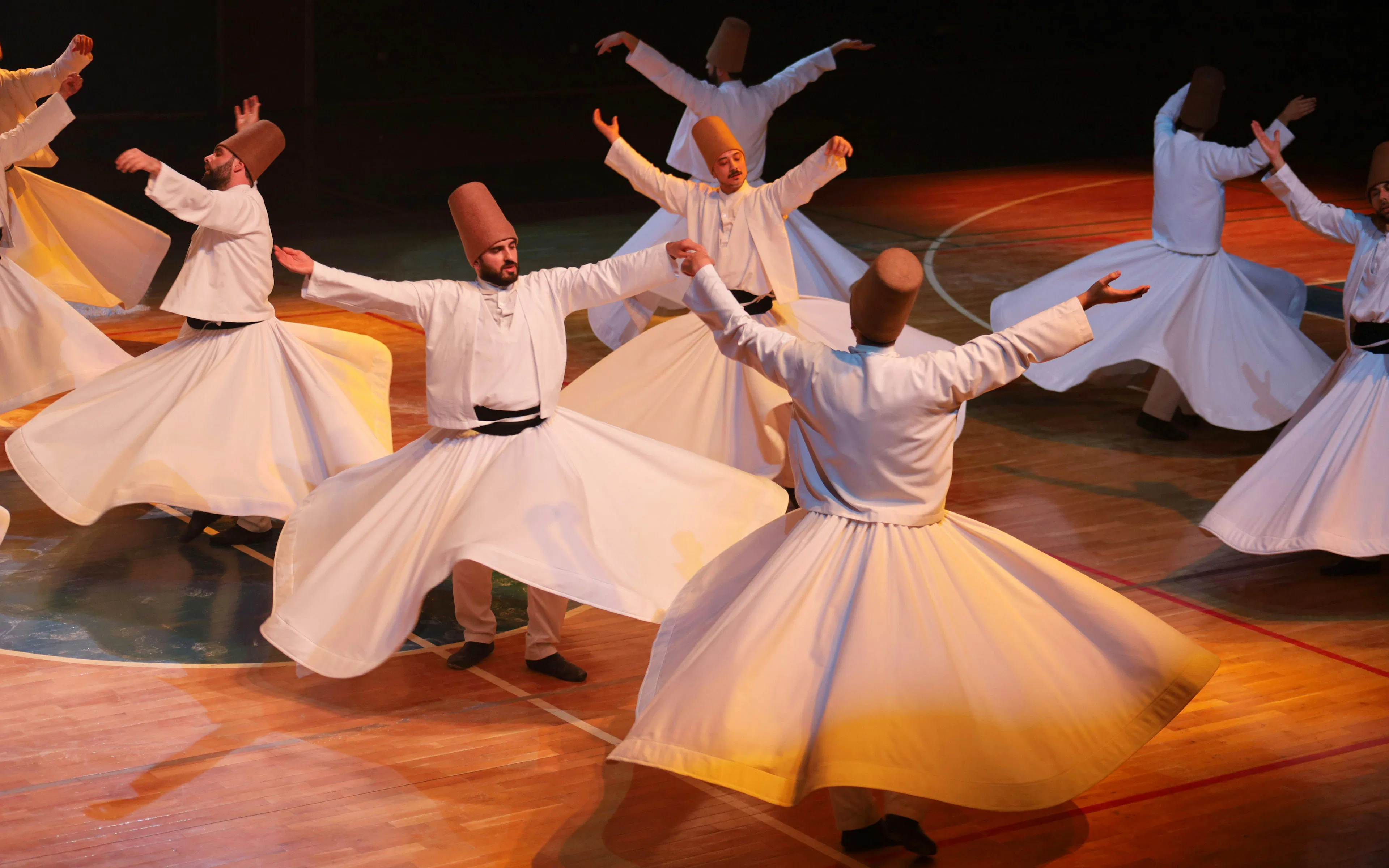 Whirling dervishes performing traditional dance in Turkey.