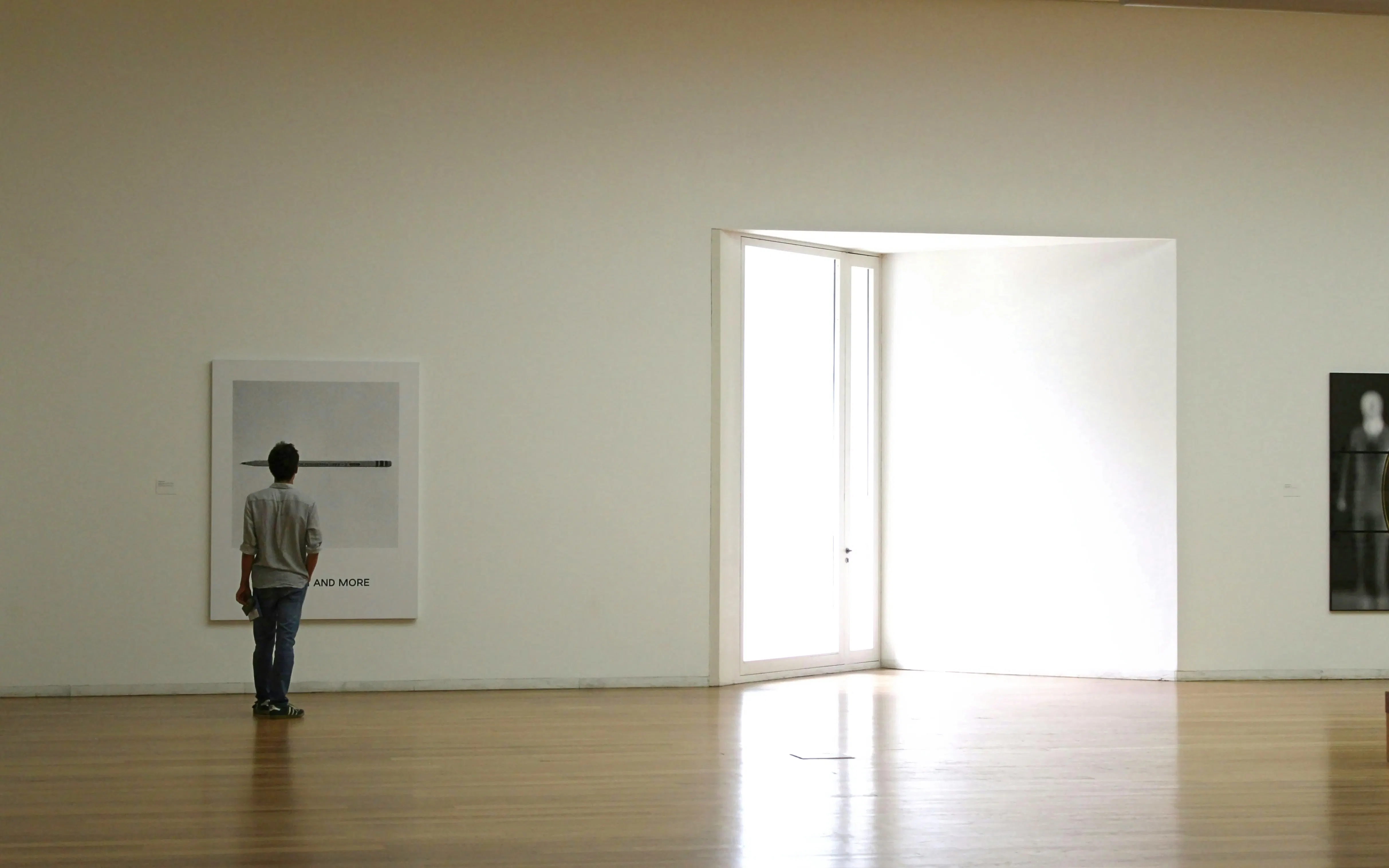 Visitor viewing artwork inside Serralves Contemporary Art Museum, Porto.