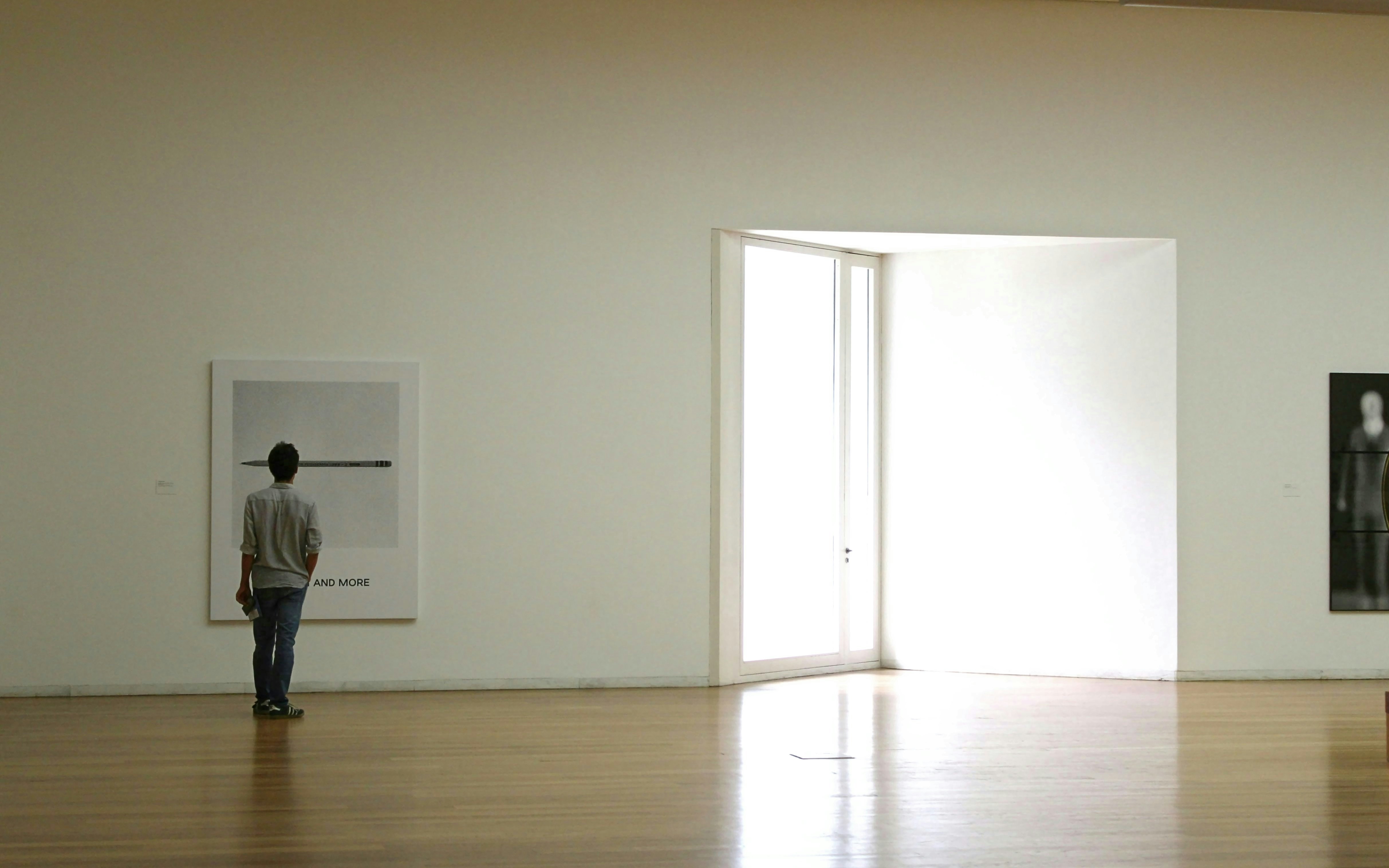 Visitor viewing artwork inside Serralves Contemporary Art Museum, Porto.
