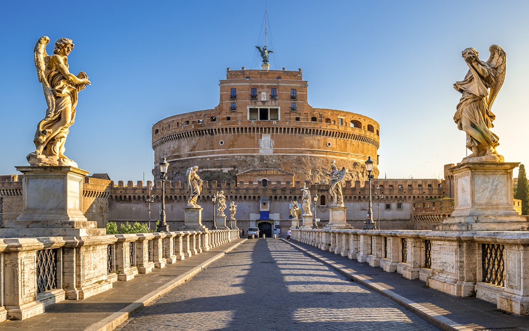 Castel Sant'Angelo with angel statues on Ponte Sant'Angelo, Rome.