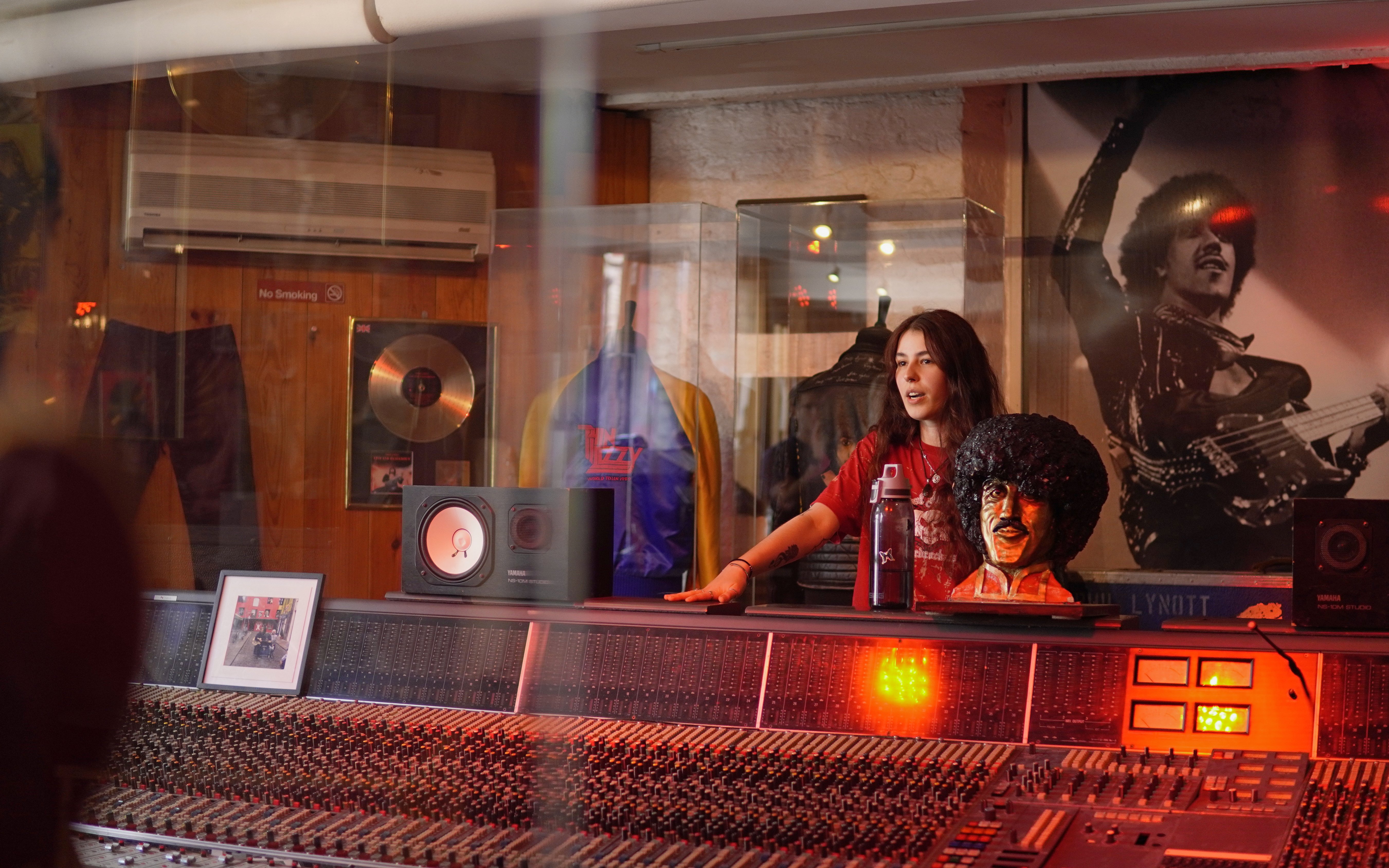 Recording studio at Irish Rock N Roll Museum with memorabilia and sound equipment.