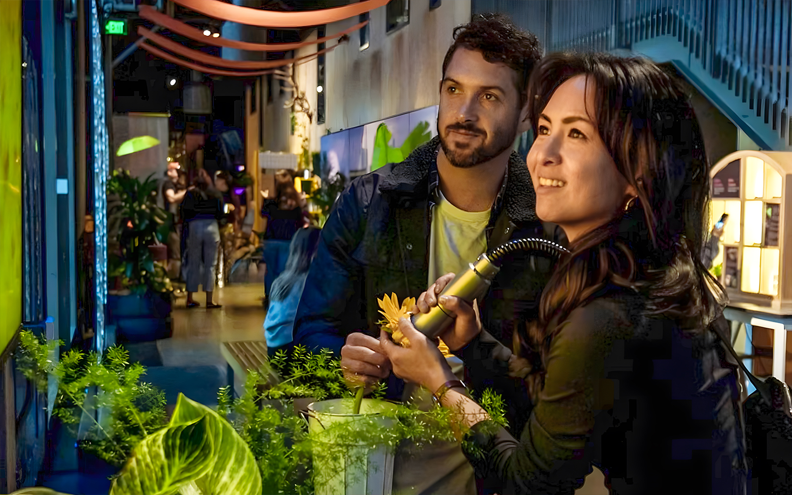 Visitors engaging with interactive exhibit at the Exploratorium, San Francisco.