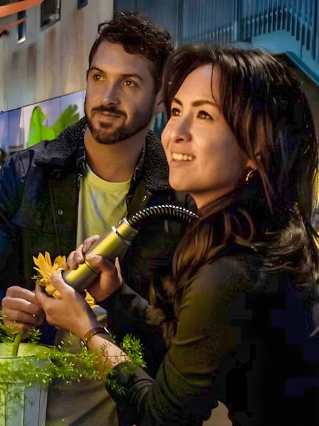Visitors engaging with interactive exhibit at the Exploratorium, San Francisco.