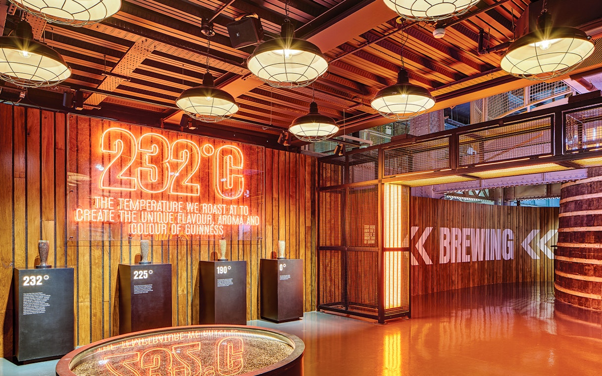 Guinness Storehouse Brewing Room with neon sign displaying 232°C roasting temperature.