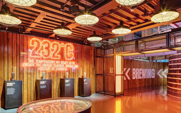 Guinness Storehouse Brewing Room with neon sign displaying 232°C roasting temperature.