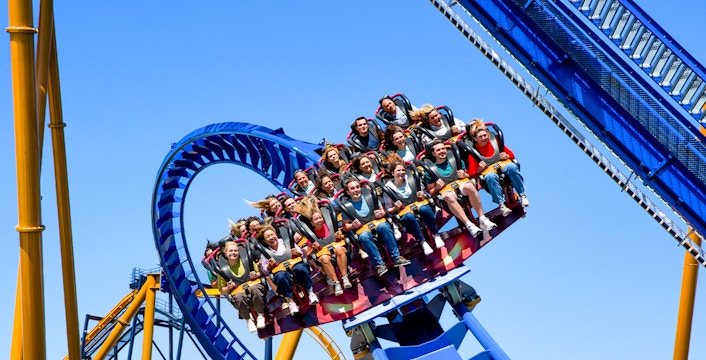 Riders on Wrath of Rakshasa roller coaster at Six Flags Great America.