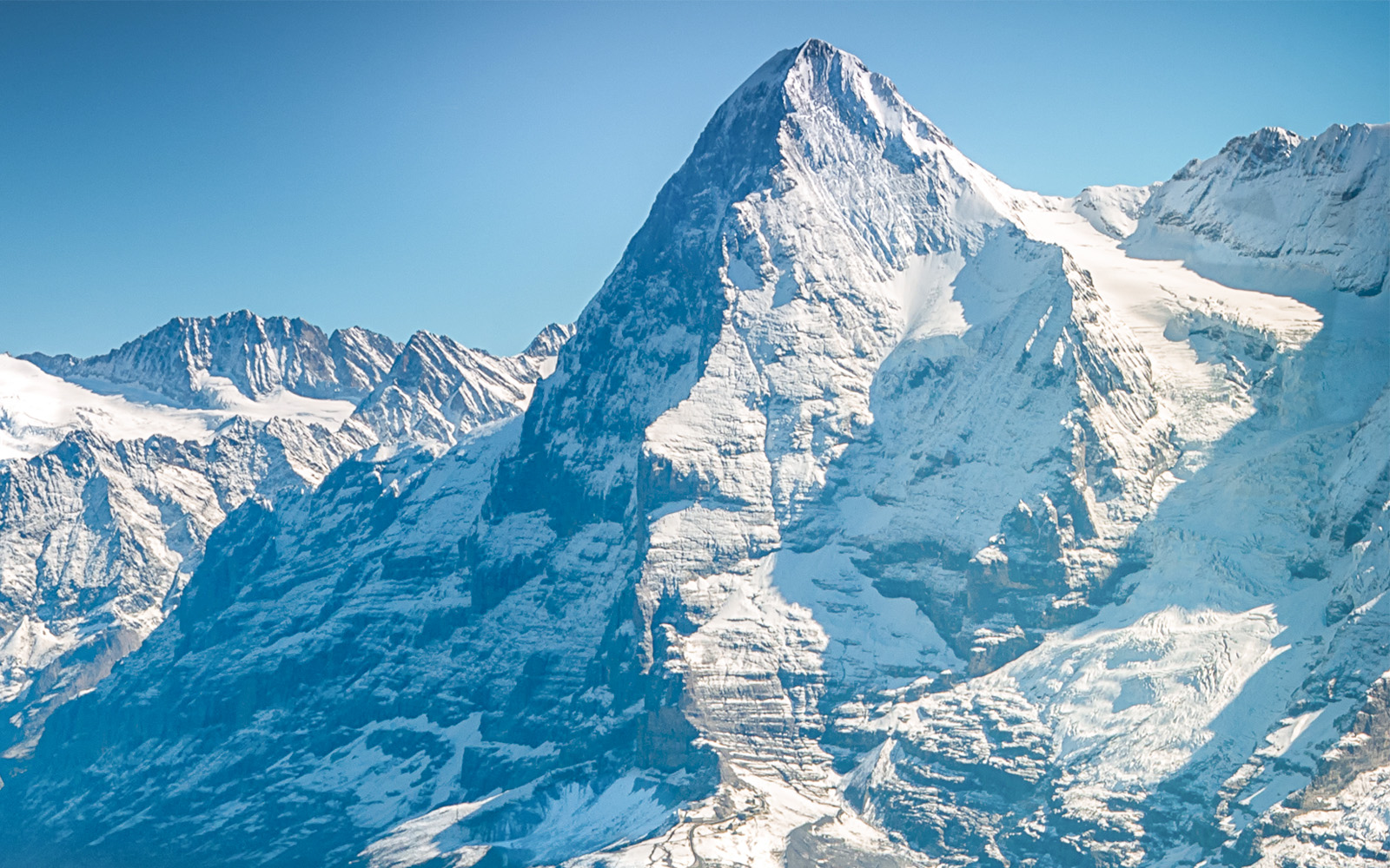 Snow-covered peaks of Jungfraujoch in the Swiss Alps.