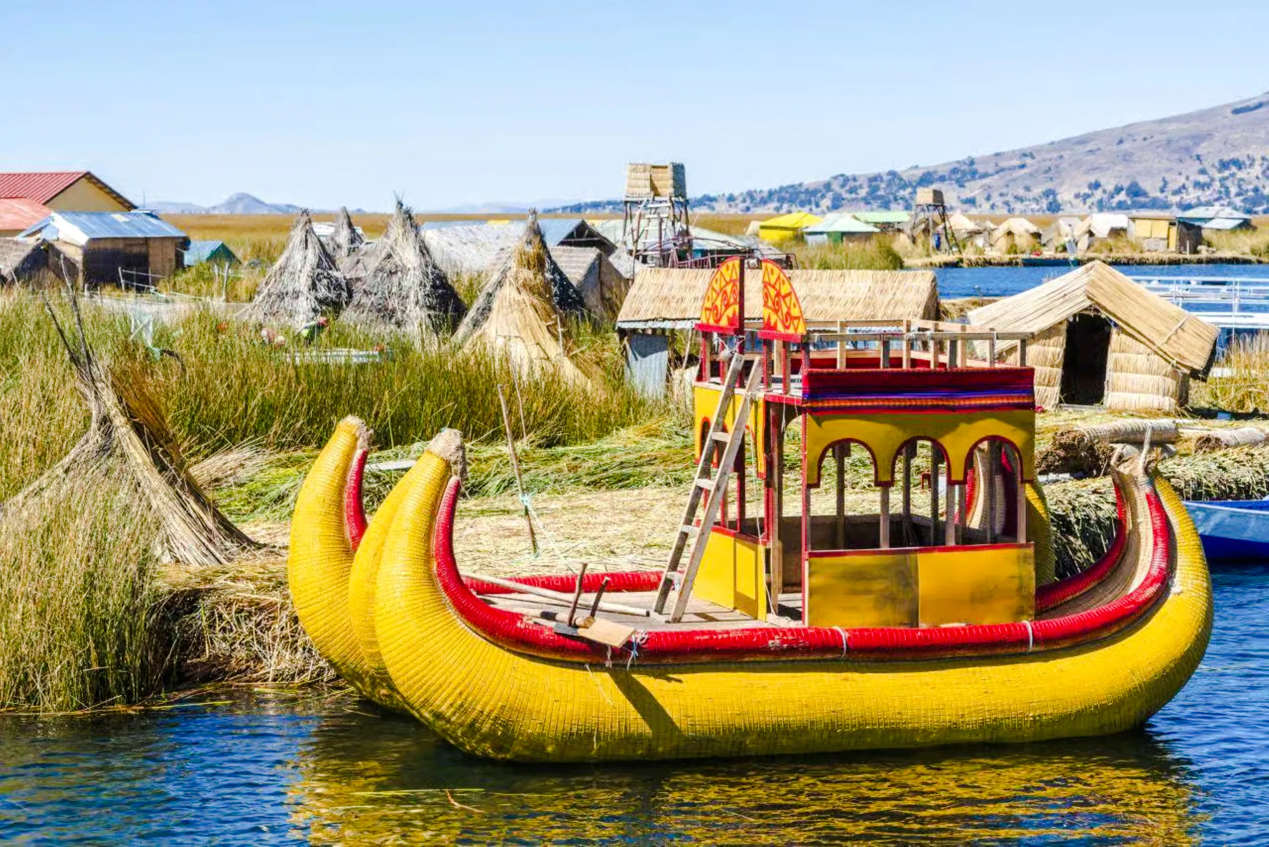 Traditional reed boat on Lake Titicaca near Uros Islands, Puno.