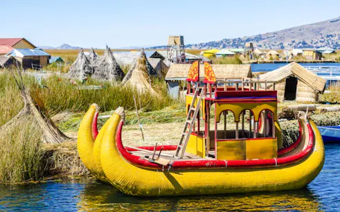 Traditional reed boat on Lake Titicaca near Uros Islands, Puno.