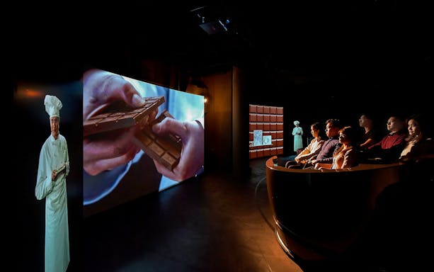 Swiss Chocolate Adventure exhibit at the Museum of Transport, Lucerne, showcasing chocolate-making process.