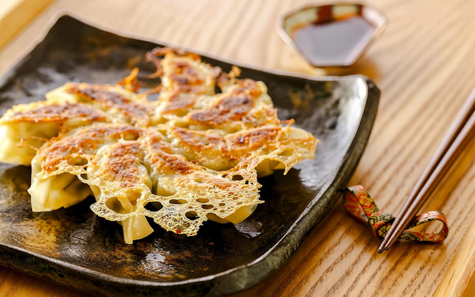 Gyoza on a plate at Tokyo Ramen and Gyoza Cooking Class.
