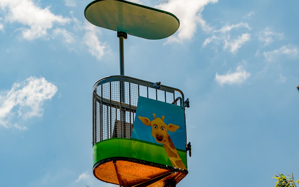 Cable car ride over animal enclosures at Lisbon Zoo, Portugal.