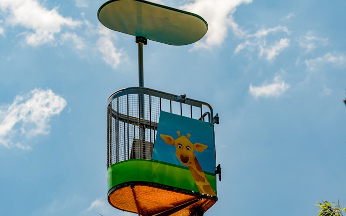 Cable car ride over animal enclosures at Lisbon Zoo, Portugal.