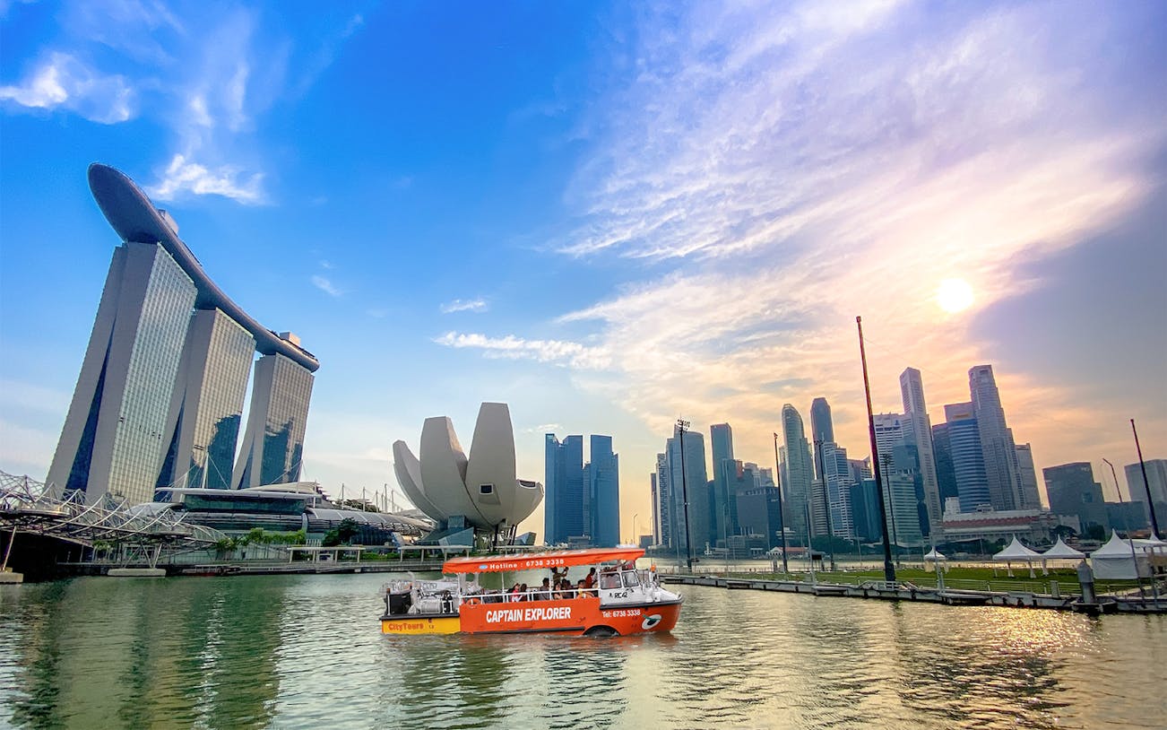 FunVee Land and Sea tour boat near Marina Bay Sands, Singapore skyline in background.