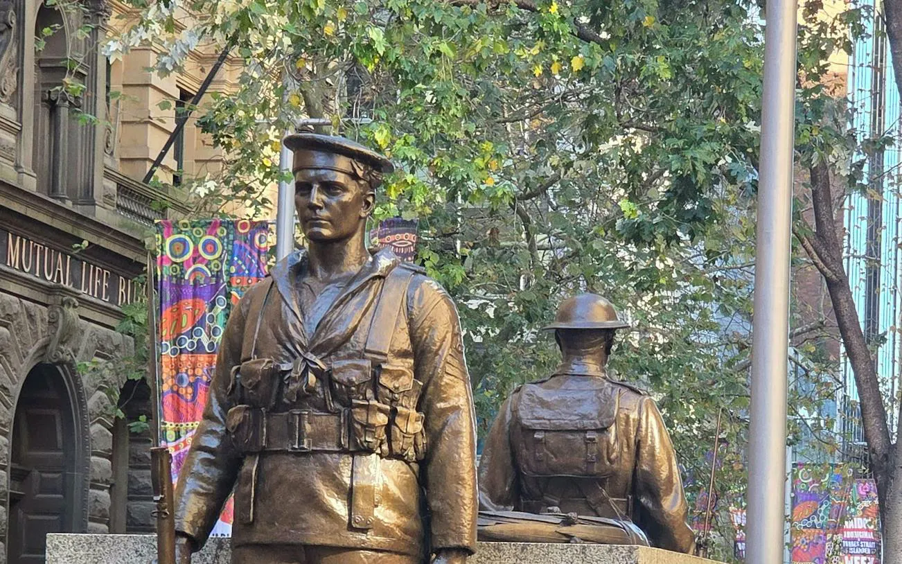 Statues of soldiers in Sydney's Queen Victoria Building area, part of the self-guided city exploration game.