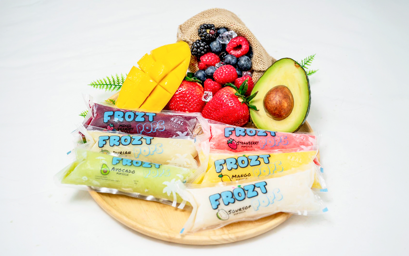 Frozt popsicles with assorted fruits on a wooden plate, Singapore Cable Car Sky Pass.