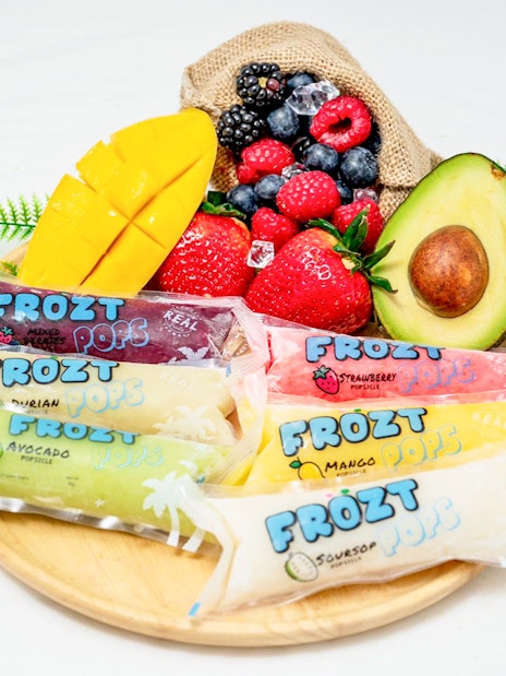 Frozt popsicles with assorted fruits on a wooden plate, Singapore Cable Car Sky Pass.