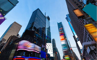 Skyscrapers and digital billboards in Times Square, New York City.