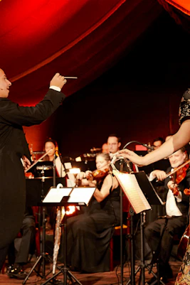 Conductor and singer performing at Strauss concert in Prater, Vienna.