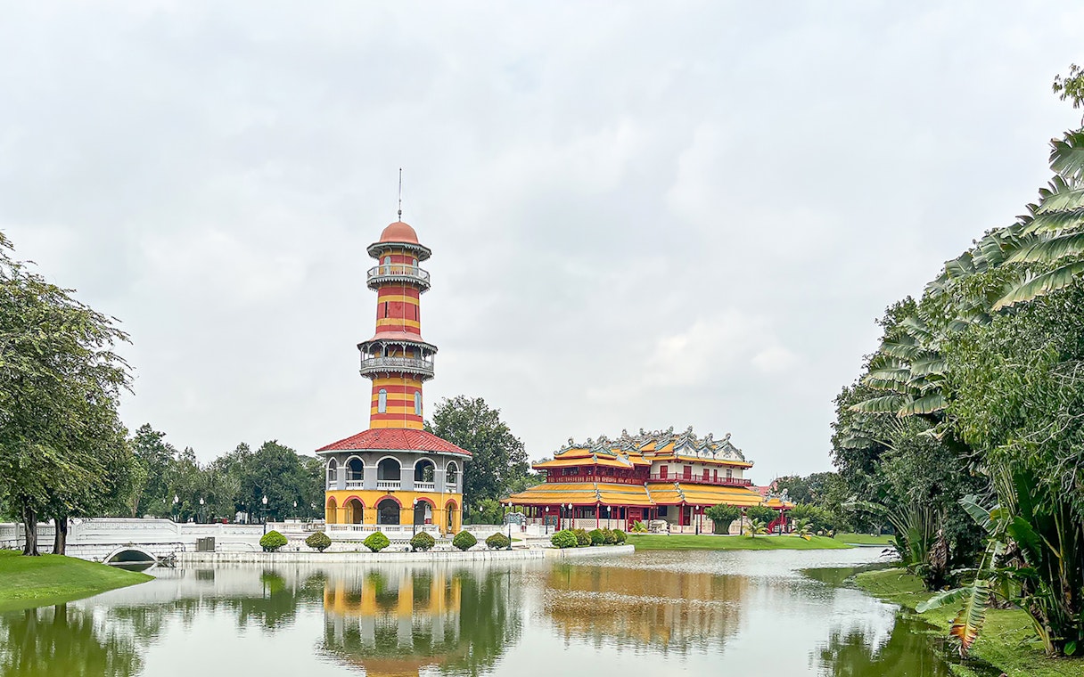 Ho Withun Thasana tower and Wehart Chamrun palace by a pond in Bang Pa-In, Ayutthaya.