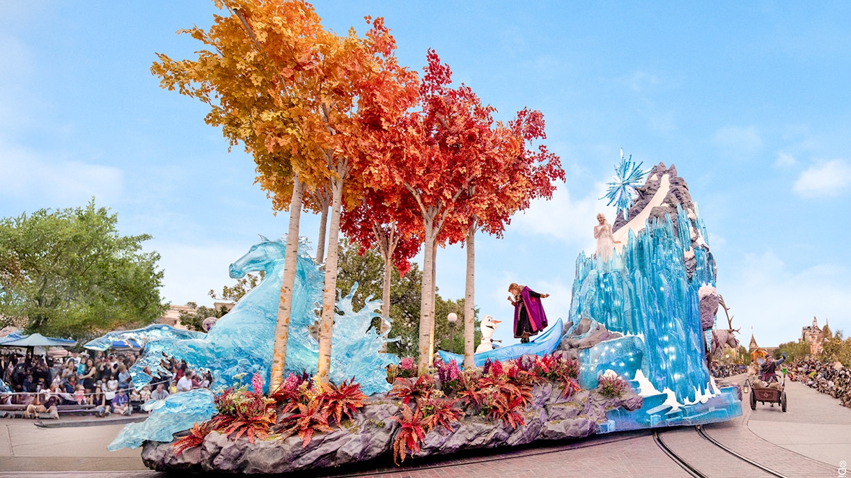 Disneyland Park parade float with Frozen characters and ice-themed decorations in California.