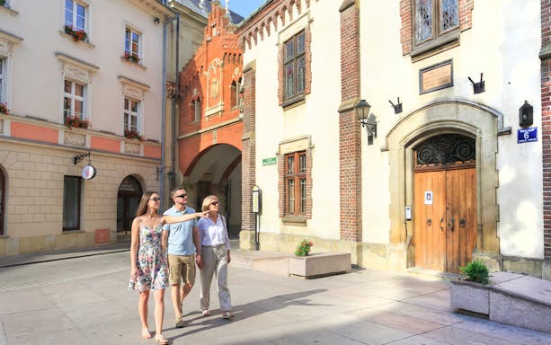 Tourists walking towards Czartoryski Museum in Krakow.