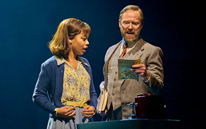 Two actors on stage in a scene from "Stranger Things: The First Shadow.