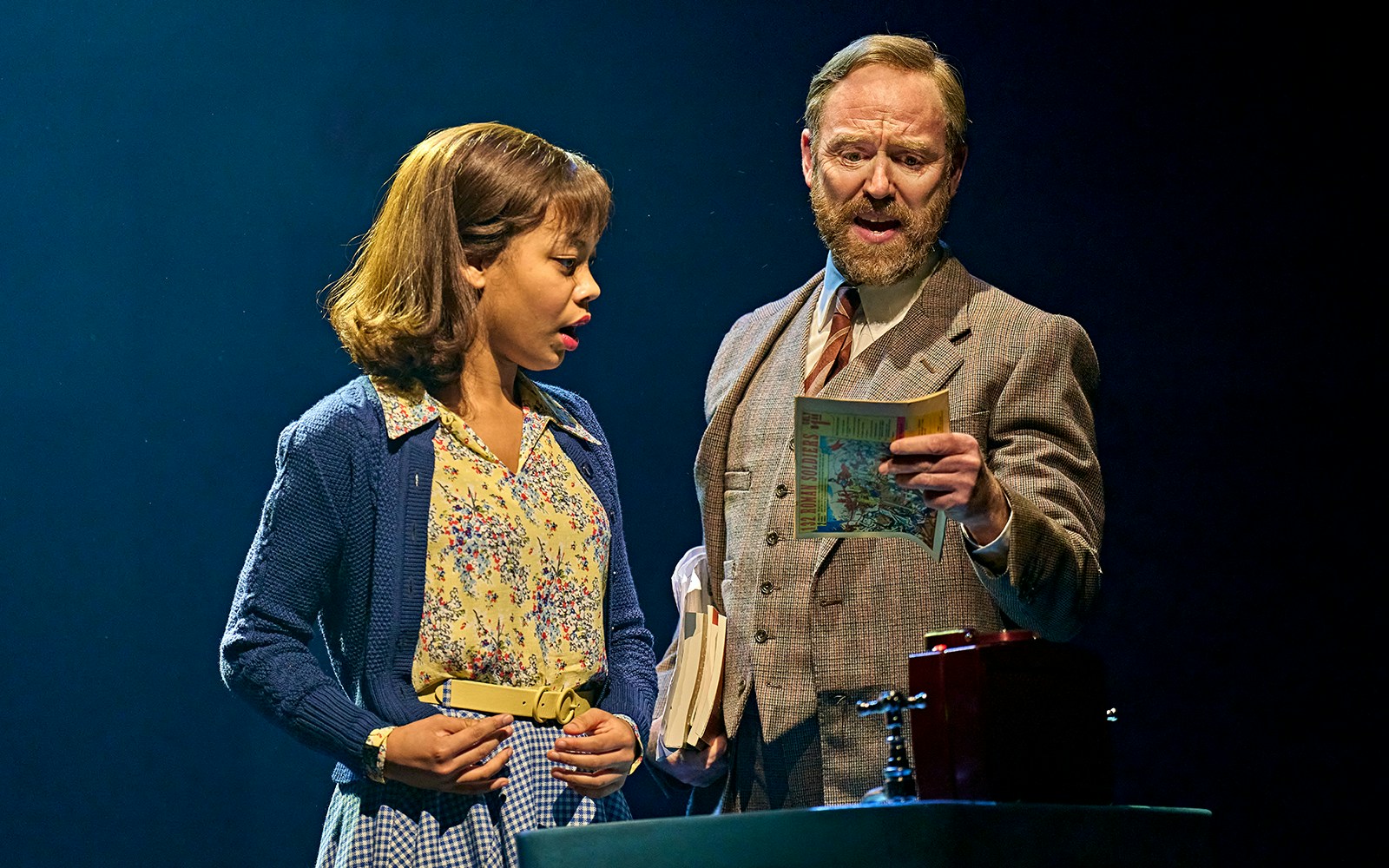 Two actors on stage in a scene from "Stranger Things: The First Shadow.