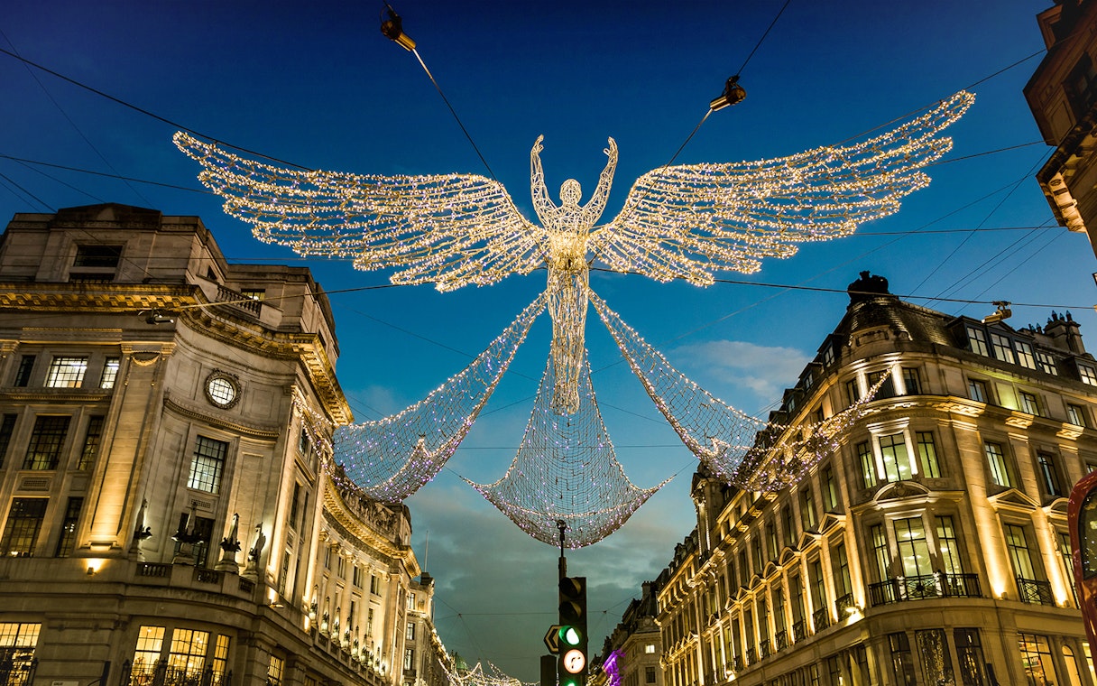 London Christmas lights display with angel decoration on Regent Street.