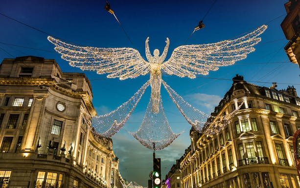 London Christmas lights display with angel decoration on Regent Street.