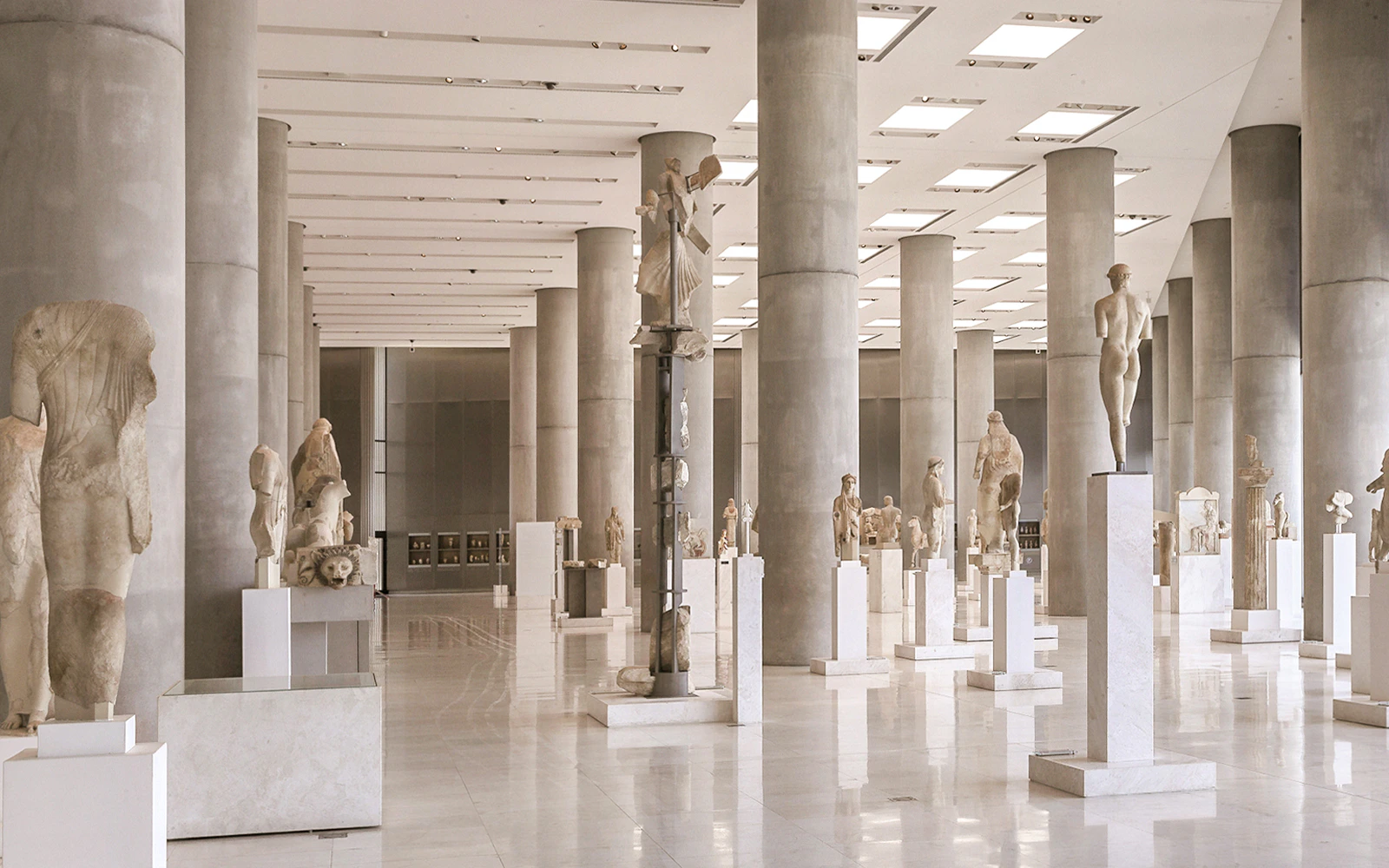 Archaic sculptures displayed in the Acropolis Museum's gallery, Athens.
