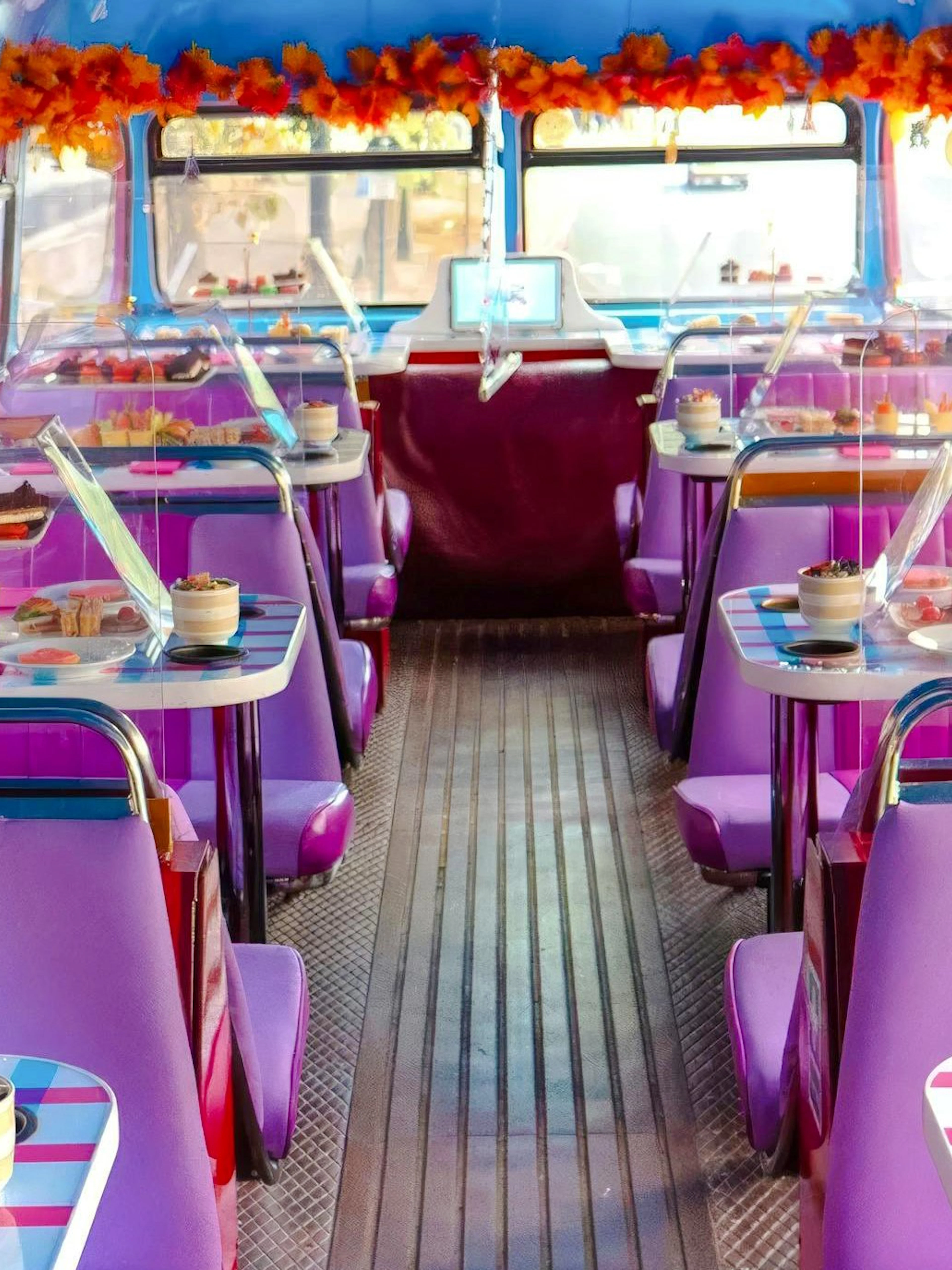 Afternoon tea setup on Brigit’s Bakery Peppa Pig Bus Tour in London.