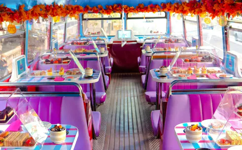 Afternoon tea setup on Brigit’s Bakery Peppa Pig Bus Tour in London.
