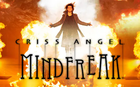 Illusionist performing amidst flames in Criss Angel Mindfreak show.