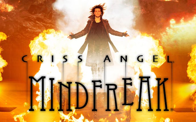 Illusionist performing amidst flames in Criss Angel Mindfreak show.