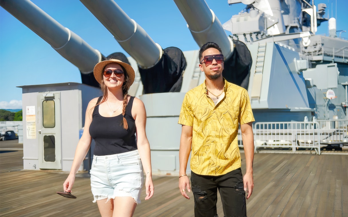 Guests walking on the deck of Battleship Missouri Memorial in Hawaii.