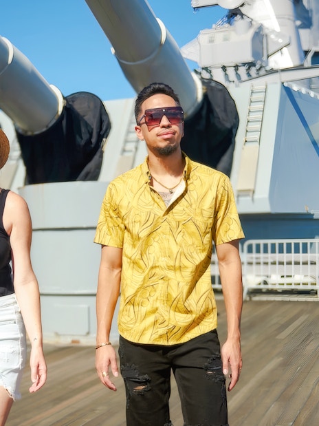 Guests walking on the deck of Battleship Missouri Memorial in Hawaii.