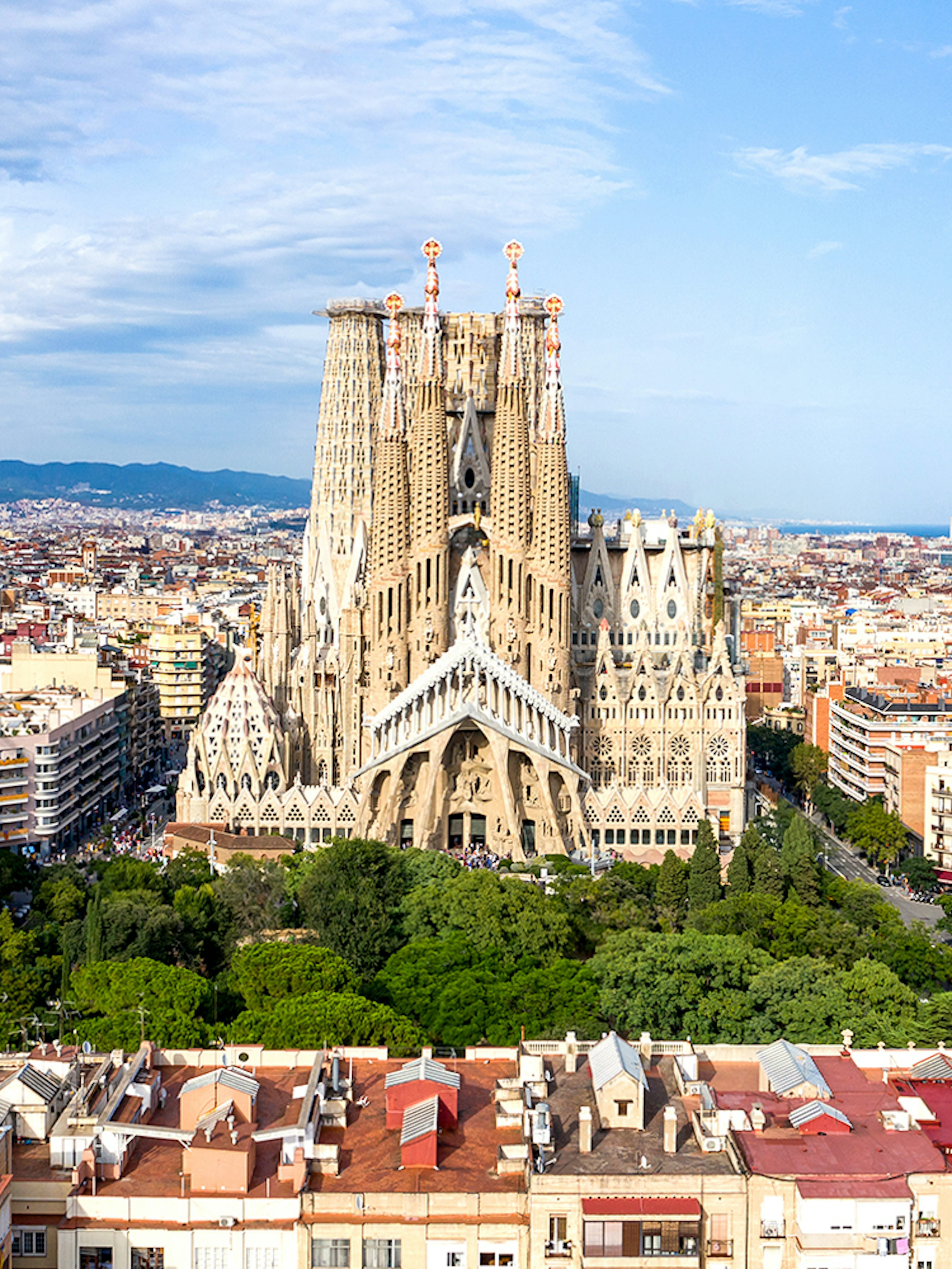 Sagrada Familia in Barcelona with cityscape background.