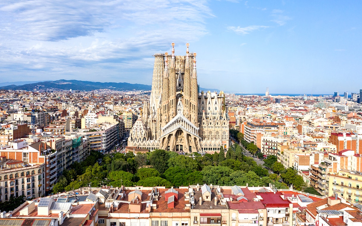 Sagrada Familia in Barcelona with cityscape background.