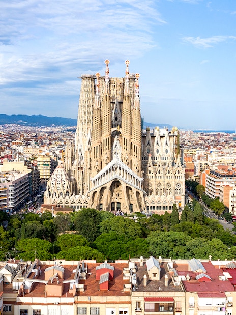 Sagrada Familia in Barcelona with cityscape background.