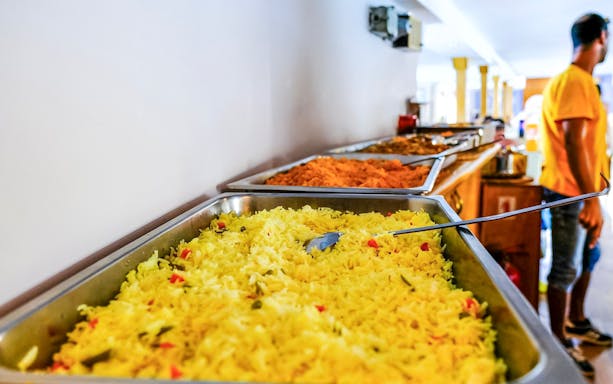 Buffet with rice and dishes on Blue Lagoon cruise from Larnaca.