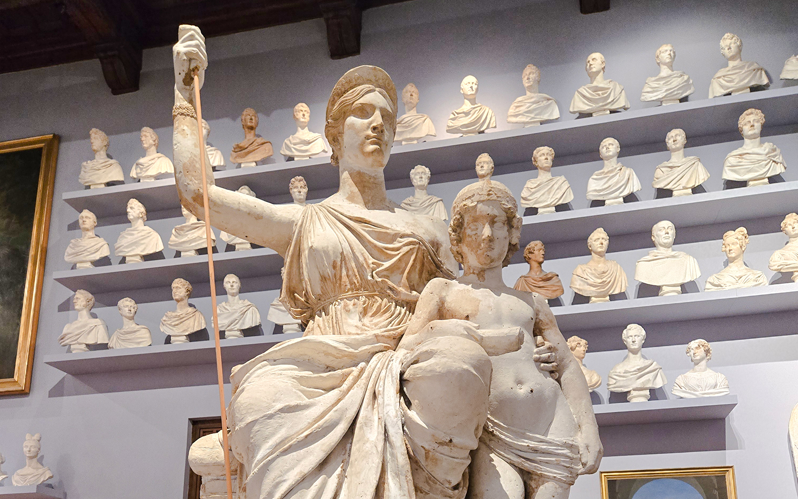 Sculpture by Lorenzo Bartolini in Accademia Gallery with busts in the background.