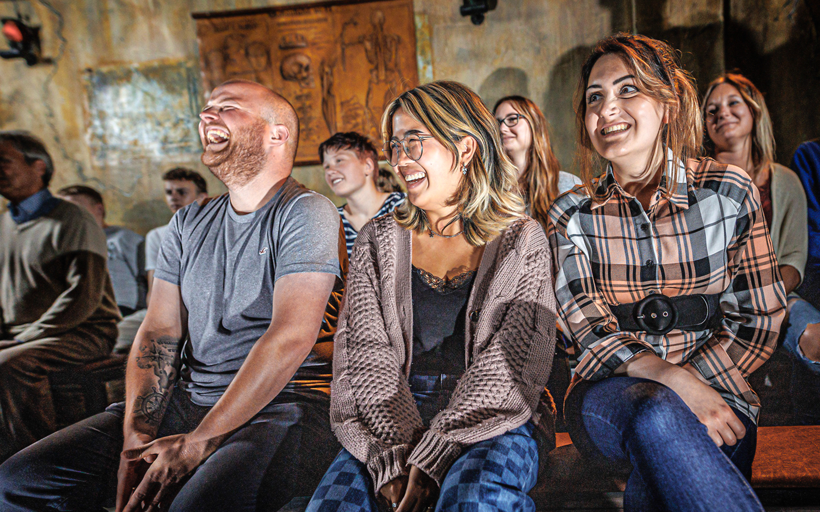 Visitors enjoying a show at Hamburg Dungeon.