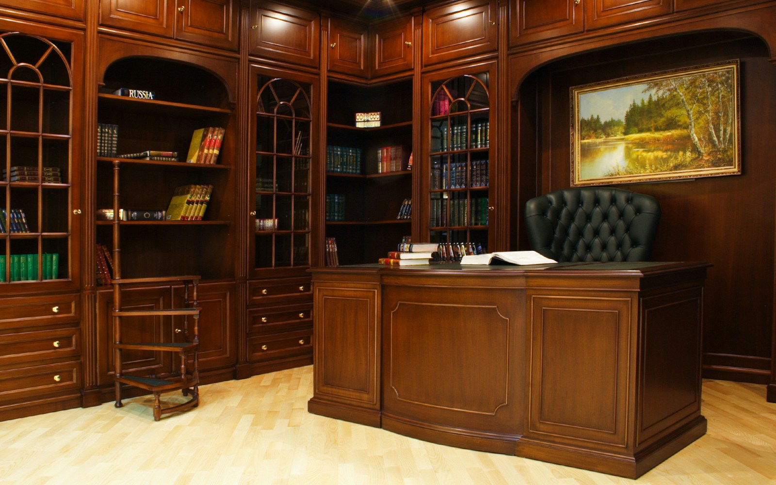 Elegant wooden office with bookshelves and desk at Jameson Office.